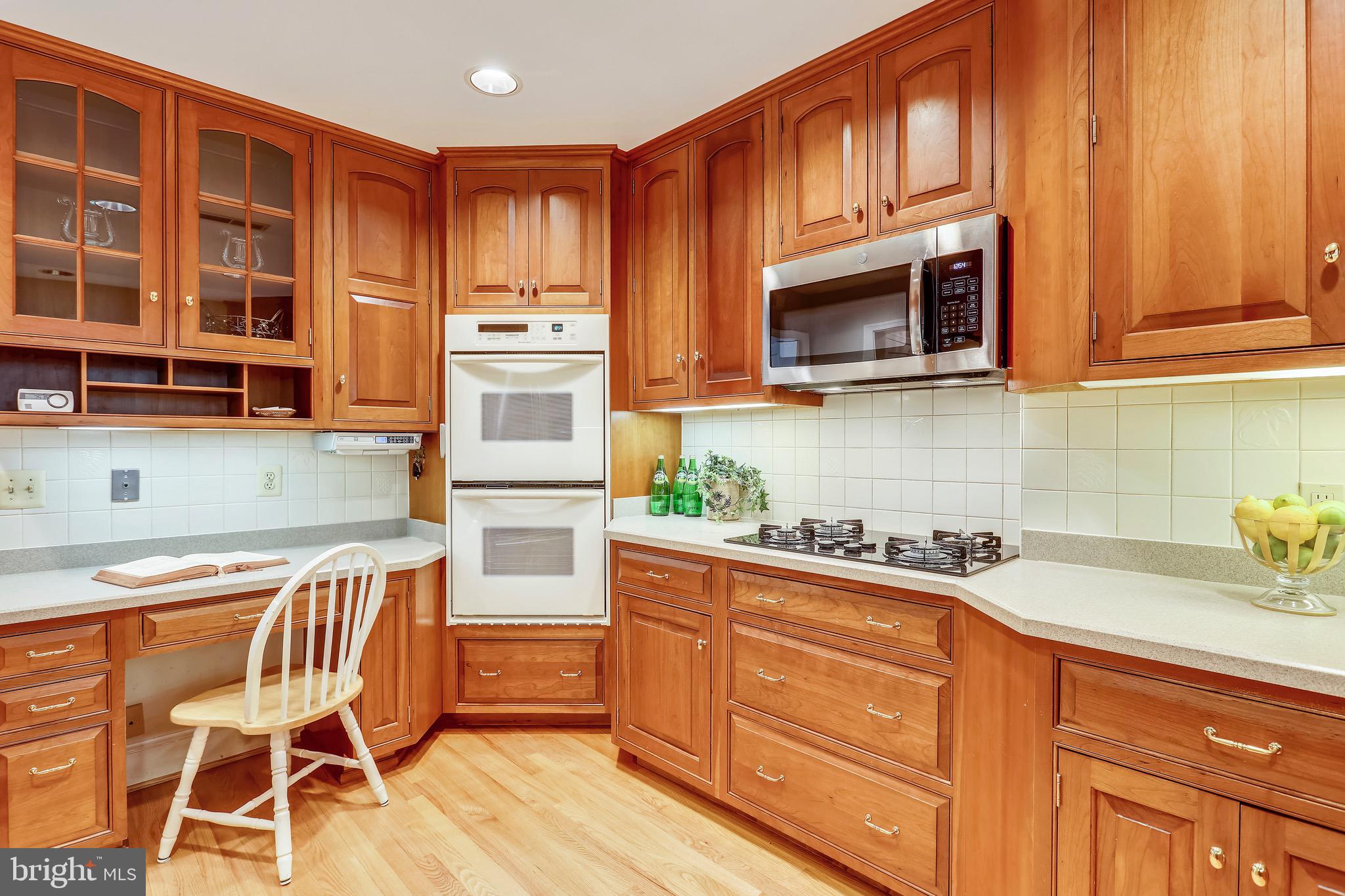 6308 Alcott Road Bethesda, MD 20817 - Photo 7 of 34 Kitchen with desk area, gas cooktop, double oven