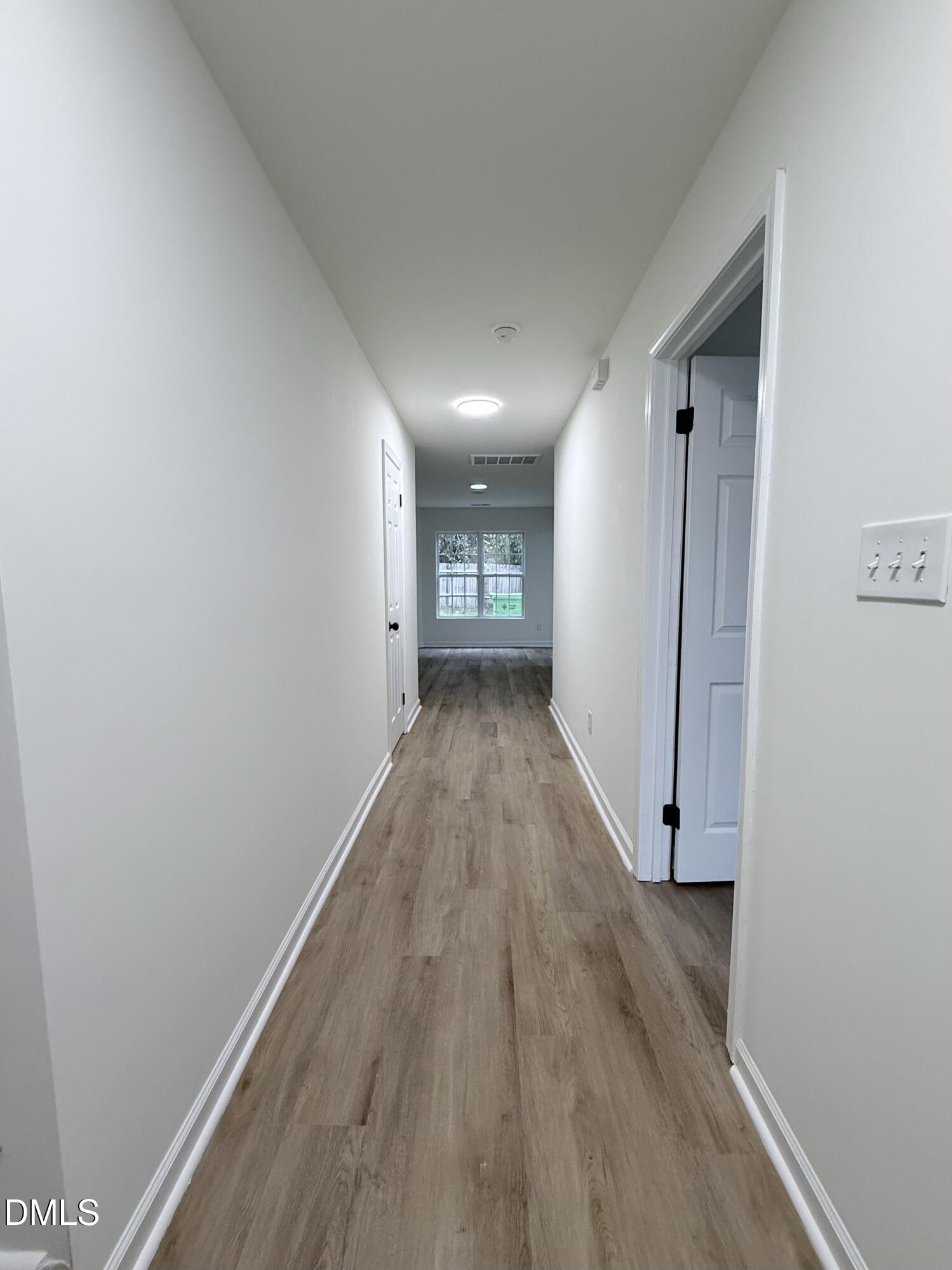 4316 Haverty Drive Raleigh, NC 27610 - Photo 2 of 16 a view of entryway with wooden floor