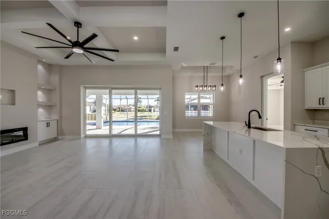 a view of a kitchen and window