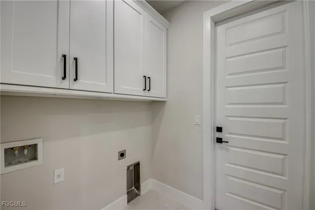 a view of cabinets and closet