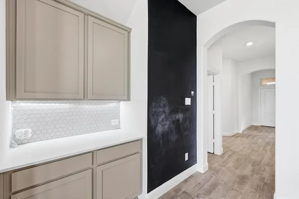 a bathroom with a bathtub and a sink