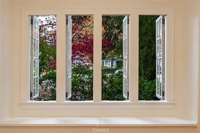 a view of a door and a window