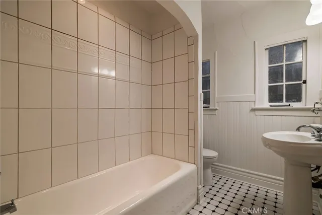 a bathroom with a sink and a bathtub