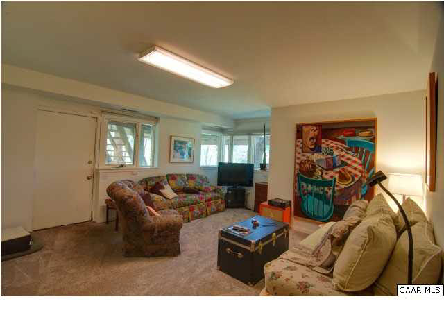 3280 Ridge Road Charlottesville, VA 22901 - Photo 12 of 30 a living room with furniture and a window
