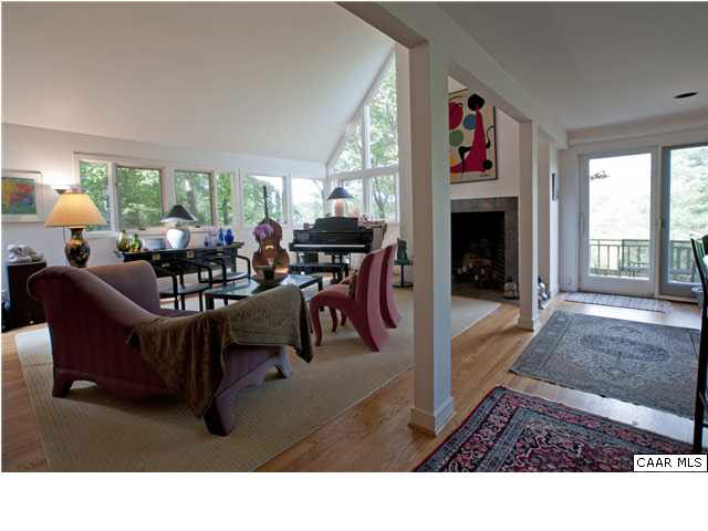 3280 Ridge Road Charlottesville, VA 22901 - Photo 13 of 30 a living room with furniture and a fireplace