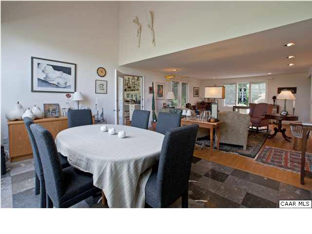 3280 Ridge Road Charlottesville, VA 22901 - Photo 15 of 30 a living room with lots of furniture and a dining table