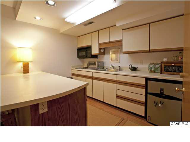 3280 Ridge Road Charlottesville, VA 22901 - Photo 25 of 30 a kitchen with a sink a stove and cabinets