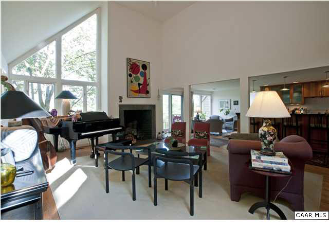 3280 Ridge Road Charlottesville, VA 22901 - Photo 3 of 30 a living room with furniture a fireplace and a large window