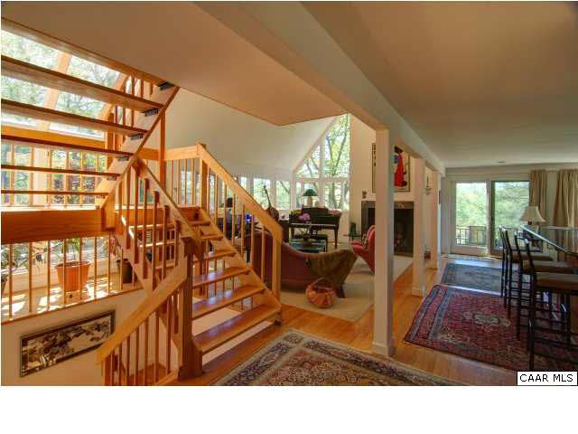 3280 Ridge Road Charlottesville, VA 22901 - Photo 5 of 30 a living room view with a lots of gym equipment
