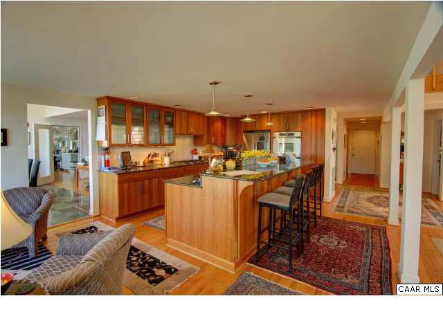 3280 Ridge Road Charlottesville, VA 22901 - Photo 6 of 30 a living room with stainless steel appliances kitchen island granite countertop furniture and a view of kitchen