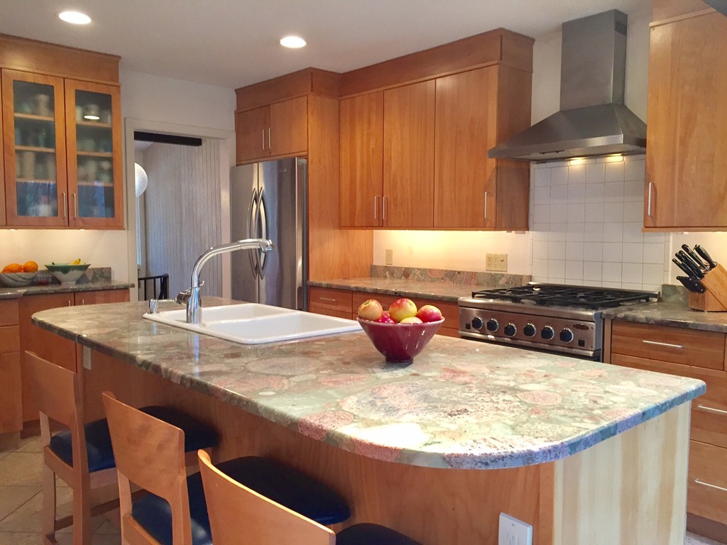 279 Market Hill Road Amherst, MA 01002 - Photo 11 of 30 a kitchen with a stove and a refrigerator