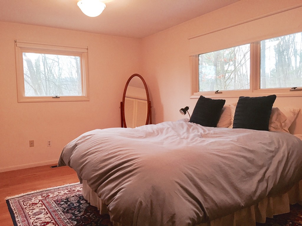 279 Market Hill Road Amherst, MA 01002 - Photo 20 of 30 a bedroom with a bed and a window