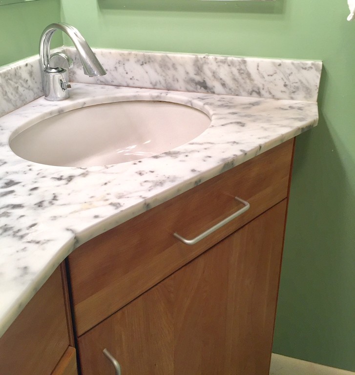 279 Market Hill Road Amherst, MA 01002 - Photo 23 of 30 a view of a sink and dishwasher with wooden floor