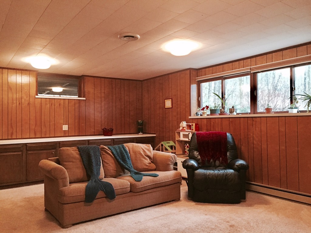 279 Market Hill Road Amherst, MA 01002 - Photo 25 of 30 a living room with furniture and a window