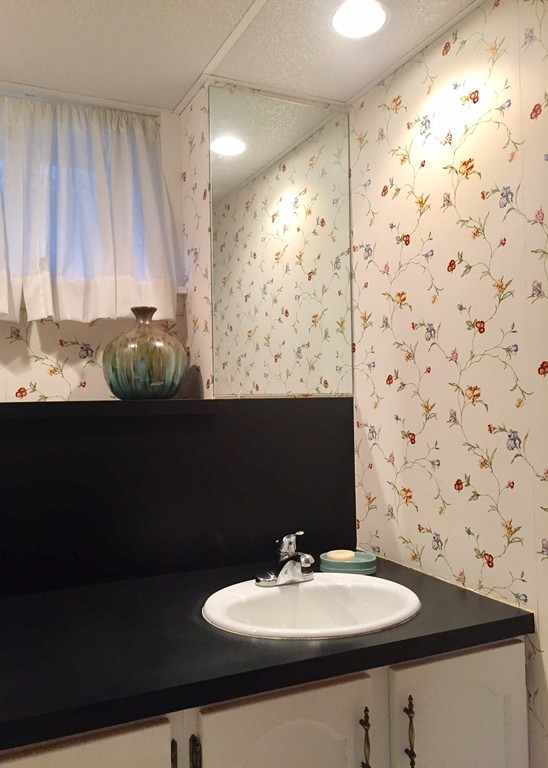279 Market Hill Road Amherst, MA 01002 - Photo 29 of 30 a bathroom with a sink and a mirror