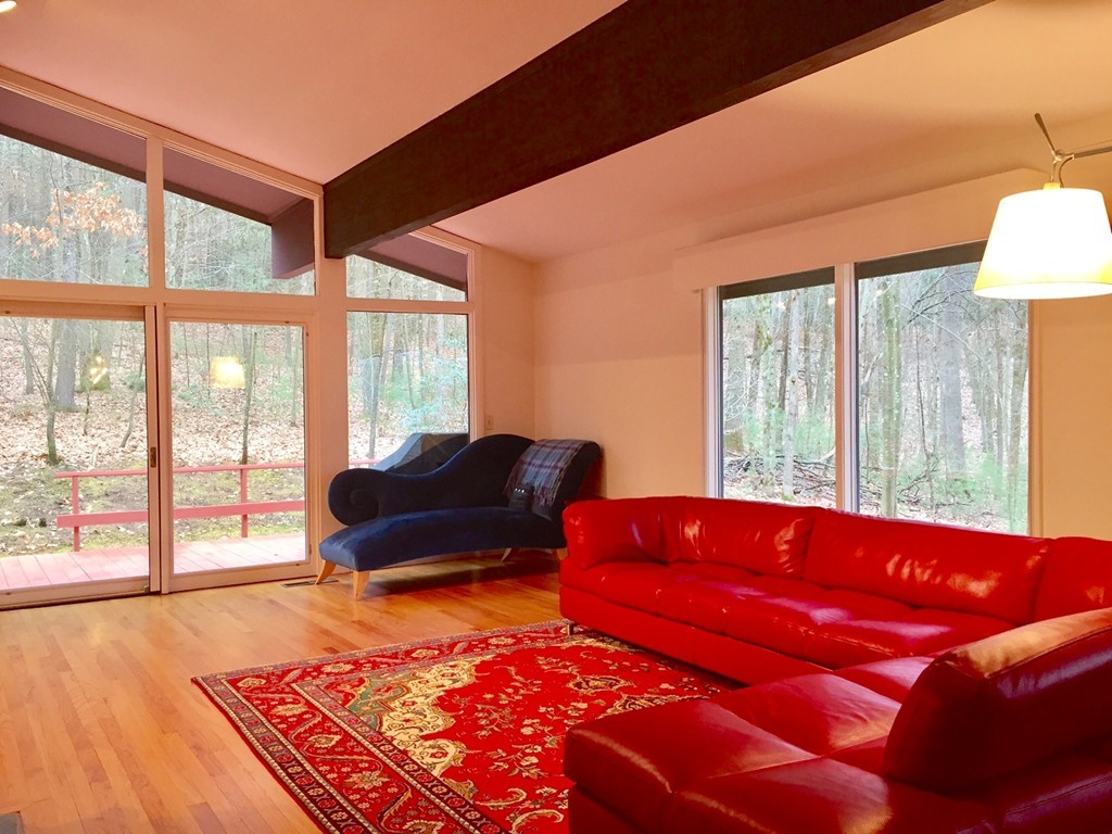 279 Market Hill Road Amherst, MA 01002 - Photo 4 of 30 a living room with furniture and a large window