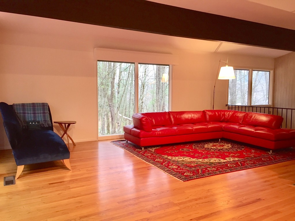 279 Market Hill Road Amherst, MA 01002 - Photo 5 of 30 a living room with furniture and floor to ceiling window