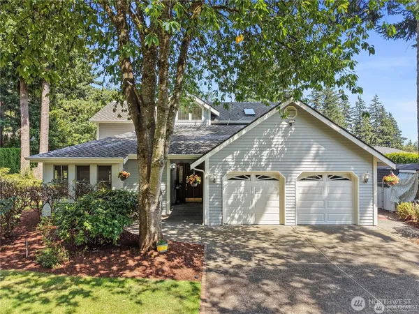 a house with a tree in front of it