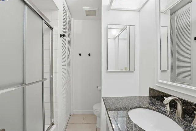 a view of storage and utility room with washer and dryer