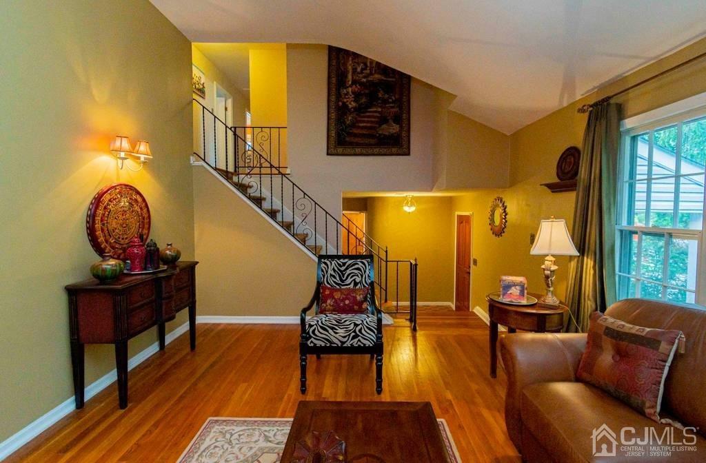 11 Hilltop Road Edison, NJ 08820 - Photo 5 of 30 a living room with furniture and a potted plant