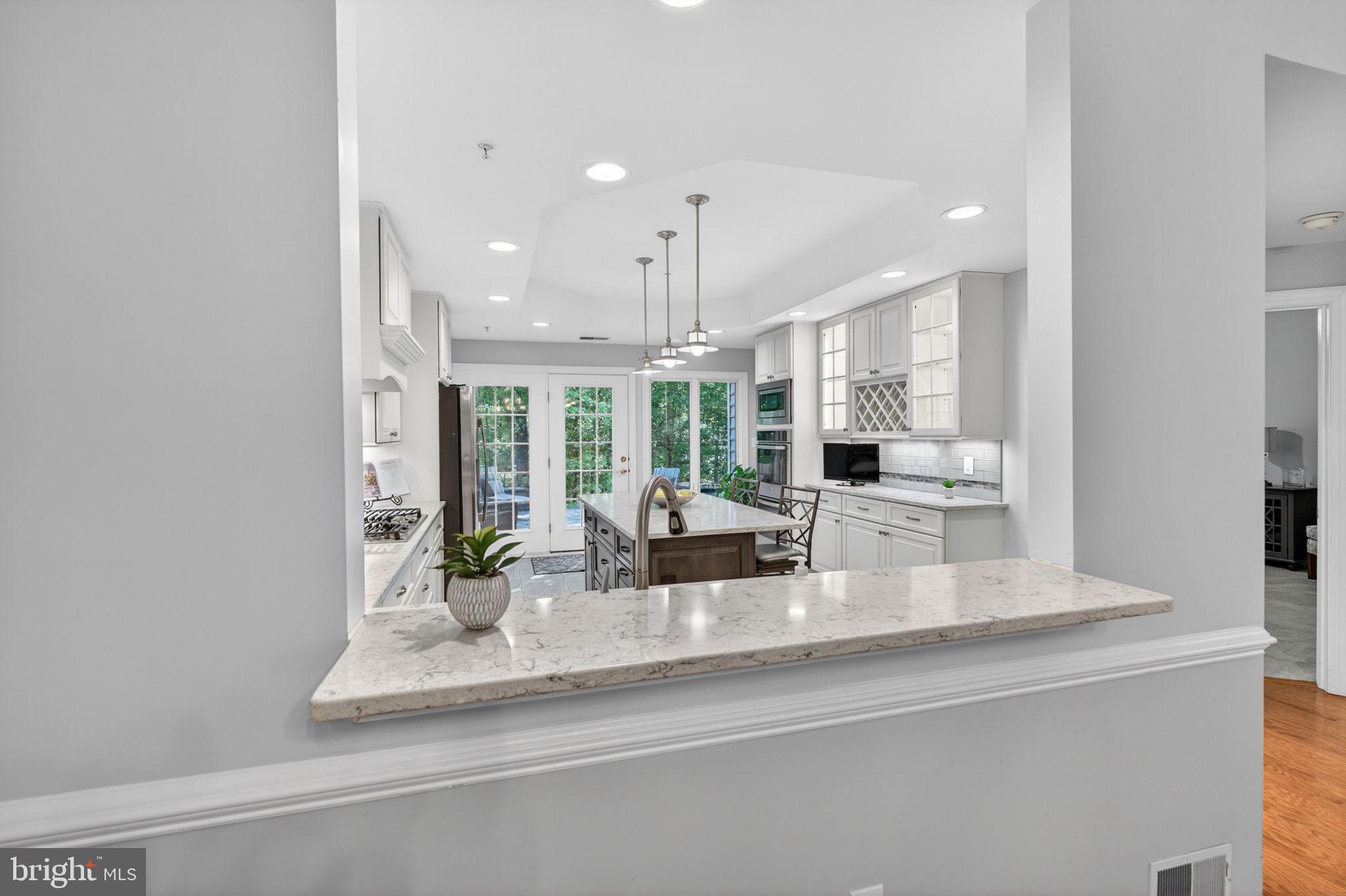 336 Colony Point Place Edgewater, MD 21037 - Photo 14 of 40 a view of kitchen with refrigerator and window