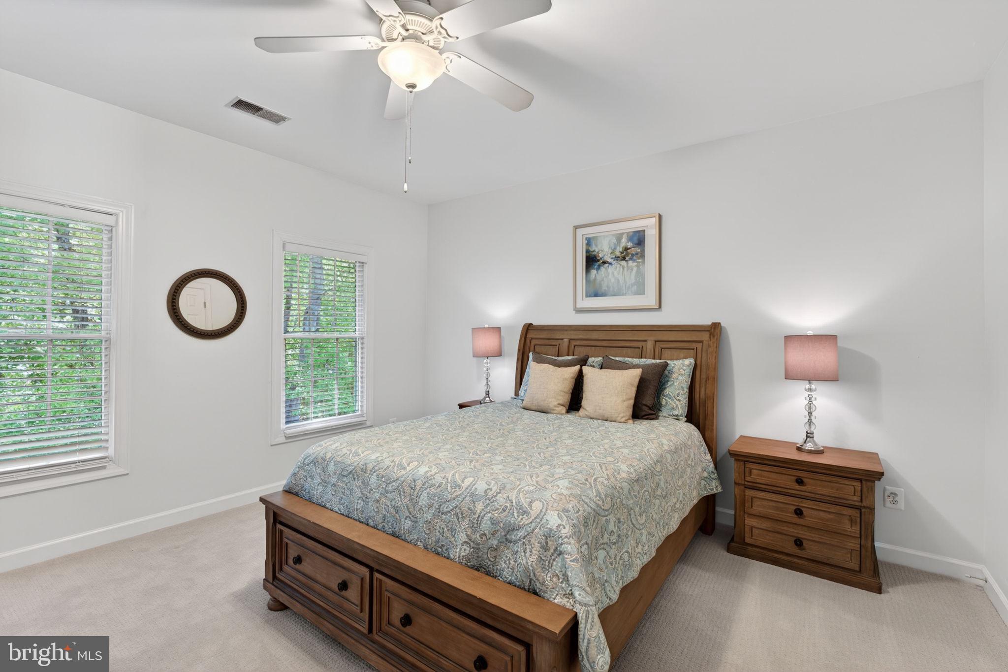 336 Colony Point Place Edgewater, MD 21037 - Photo 34 of 40 a bedroom with a bed and window