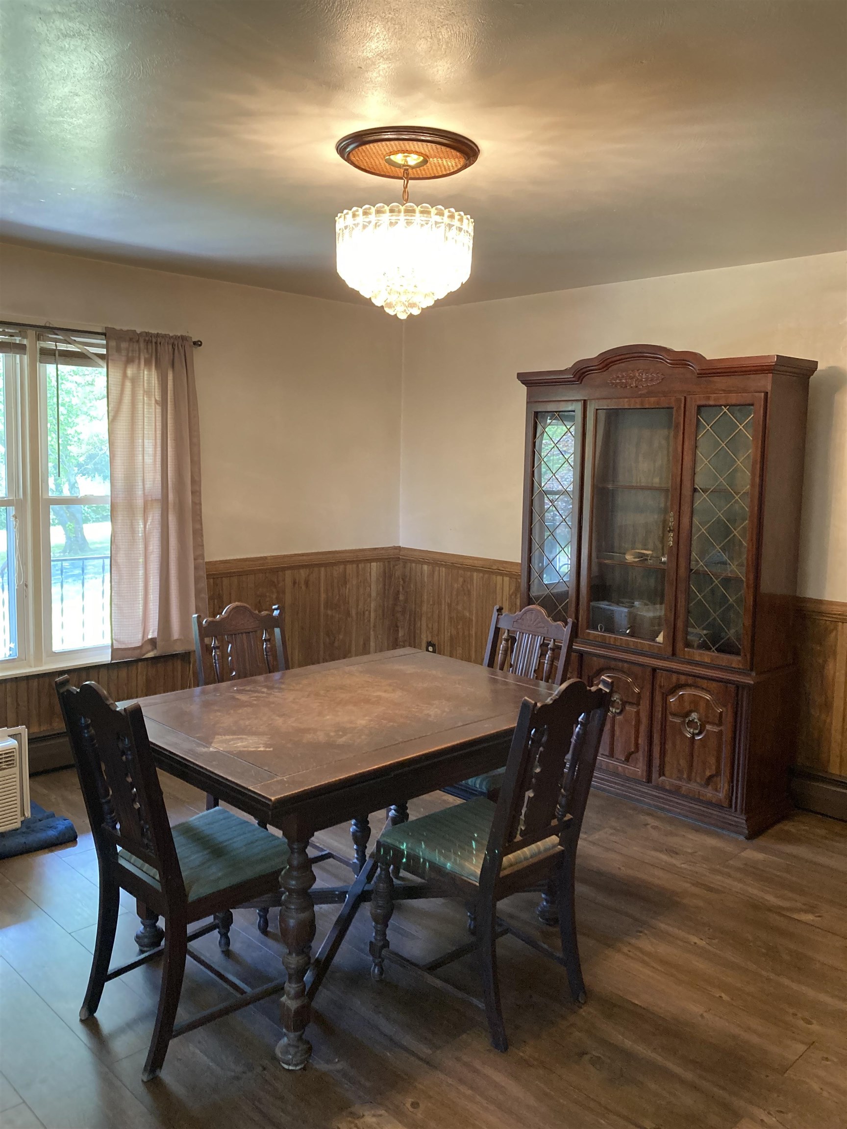 17850 Caledonia Road Caledonia, IL 61011 - Photo 17 of 20 a view of a dining room with furniture window and wooden floor