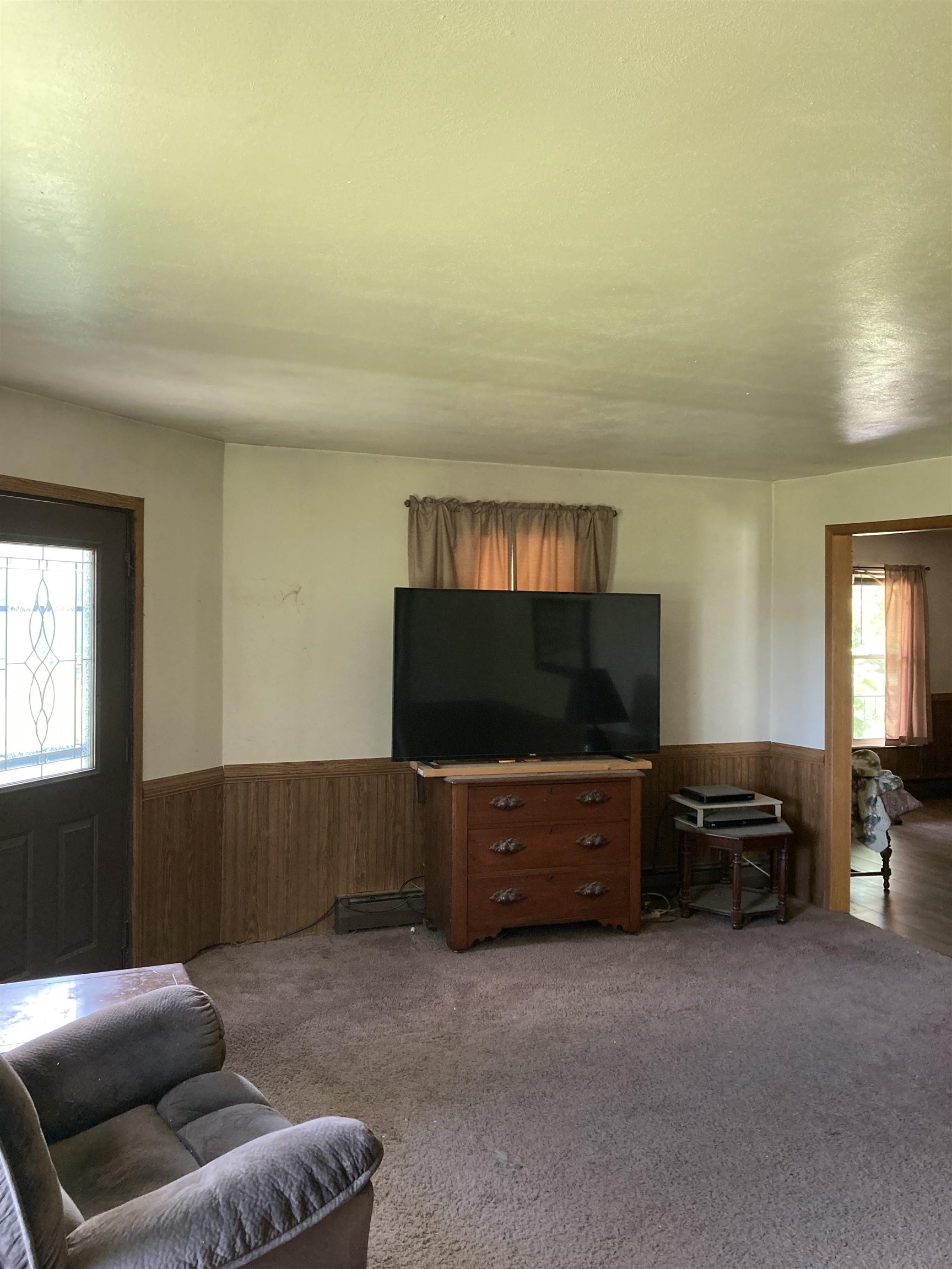 17850 Caledonia Road Caledonia, IL 61011 - Photo 18 of 20 a living room with furniture and a flat screen tv