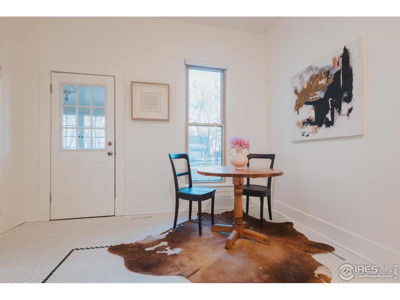 506 South Howes Street Fort Collins, CO 80521 - Photo 20 of 37 a dining room with furniture and window