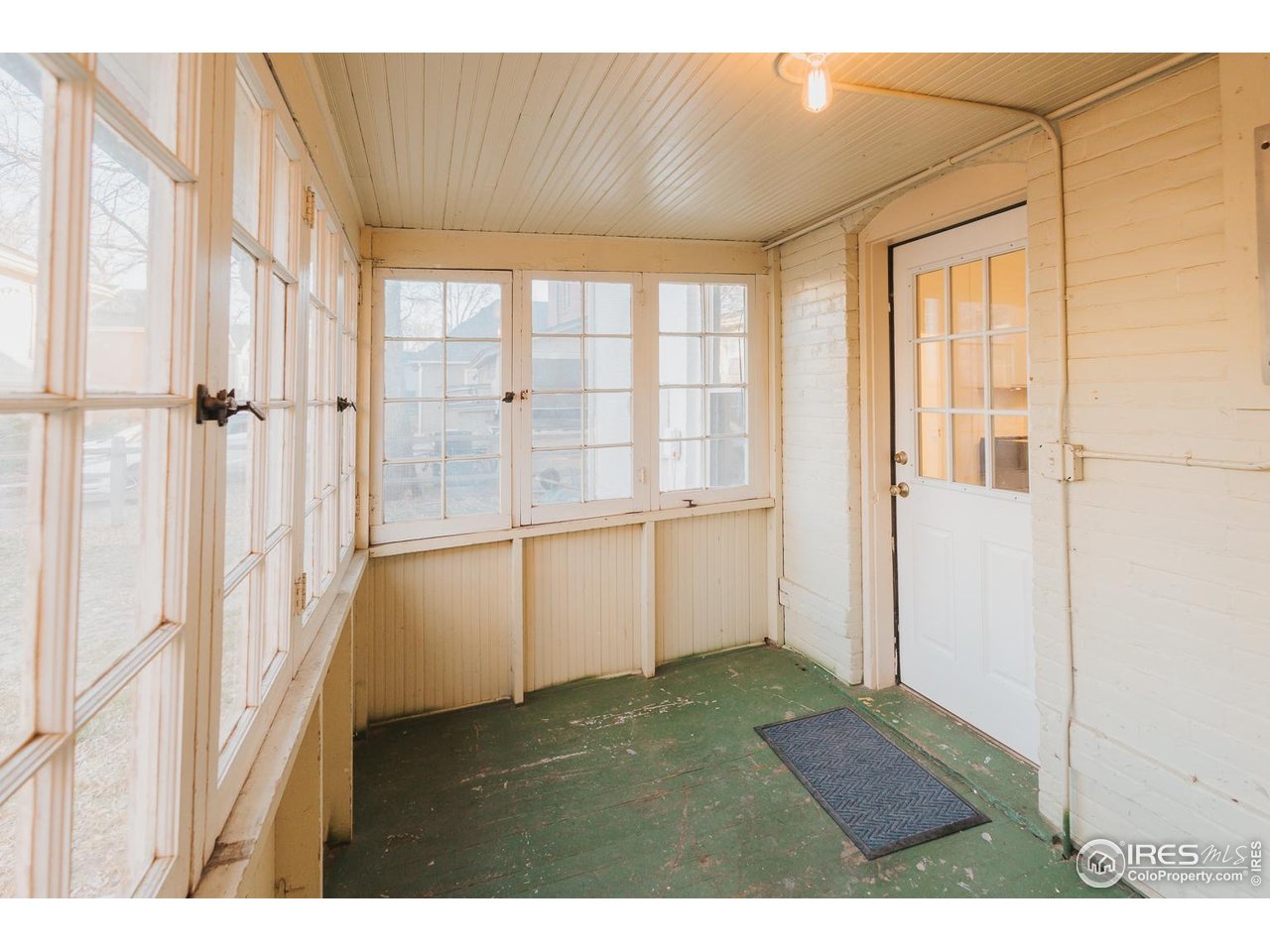 506 South Howes Street Fort Collins, CO 80521 - Photo 32 of 37 a view of an entryway with wooden floor