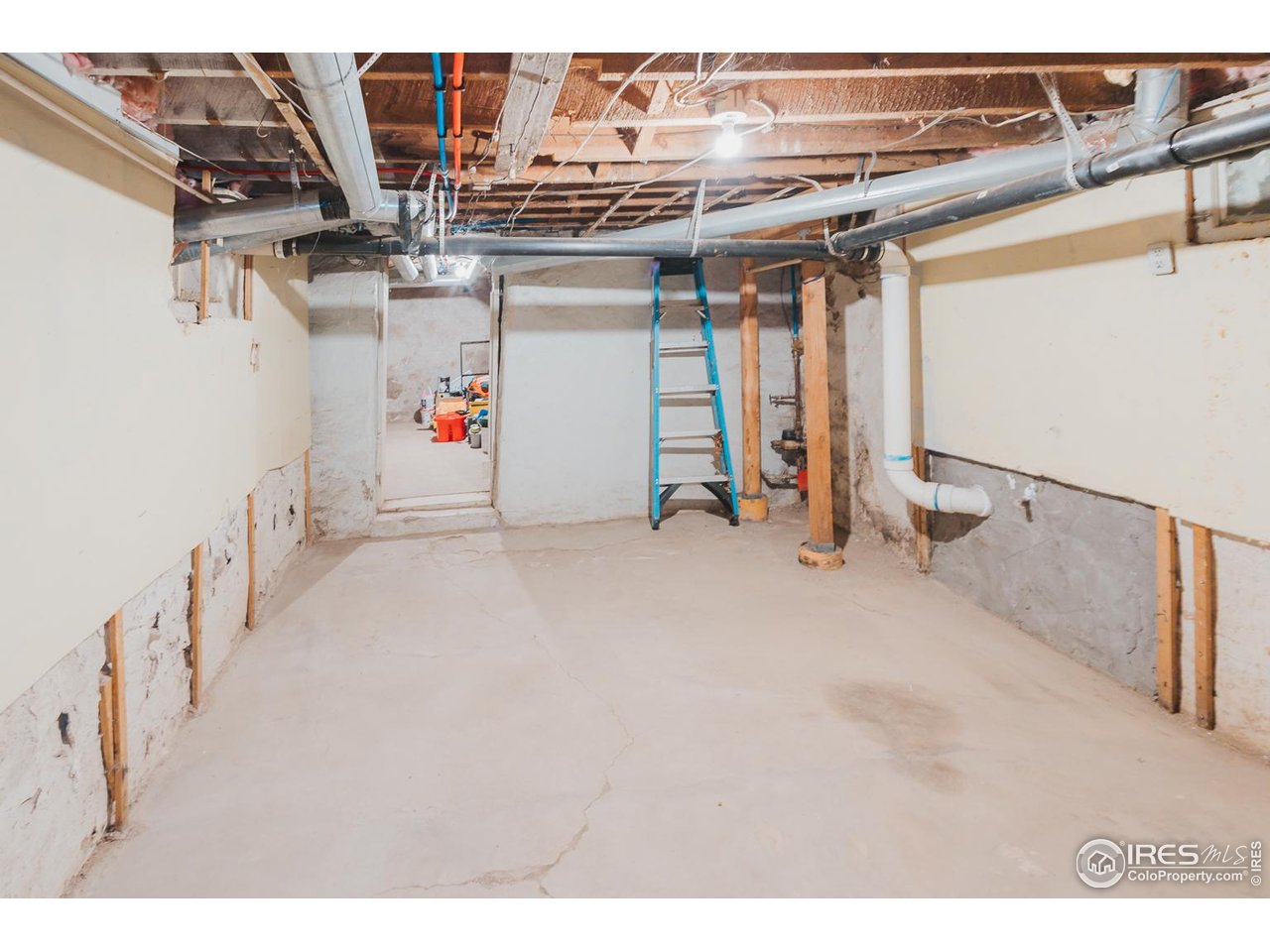 506 South Howes Street Fort Collins, CO 80521 - Photo 34 of 37 a view of storage and utility room