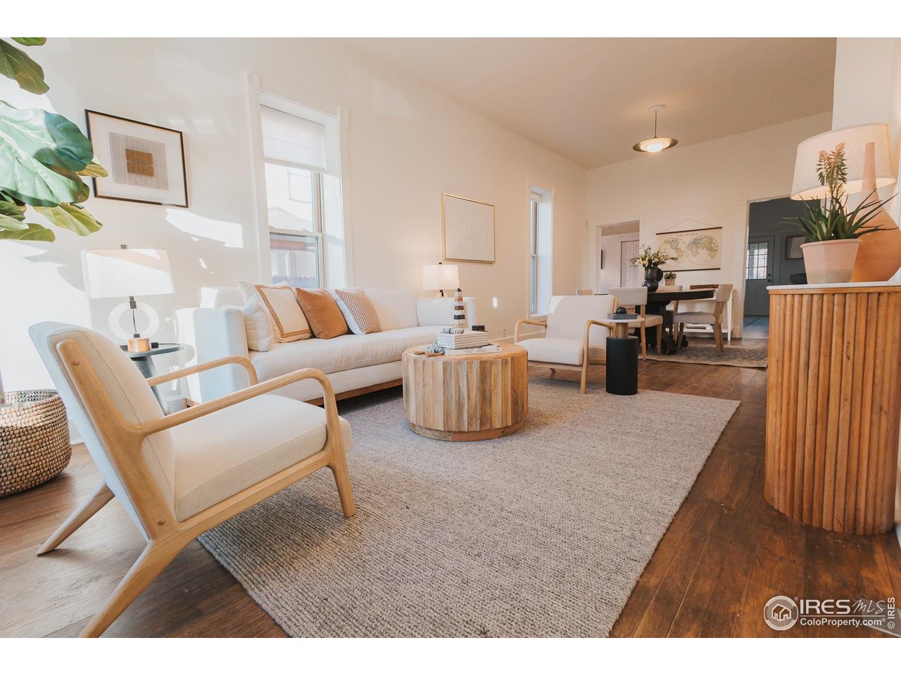 506 South Howes Street Fort Collins, CO 80521 - Photo 5 of 37 a living room with furniture and a table