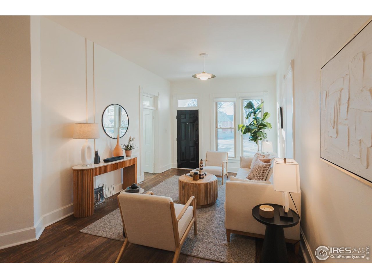 506 South Howes Street Fort Collins, CO 80521 - Photo 8 of 37 a living room with furniture and wooden floor