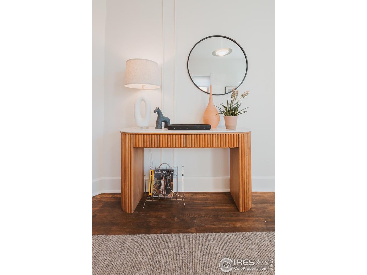 506 South Howes Street Fort Collins, CO 80521 - Photo 9 of 37 a living room with furniture and a mirror