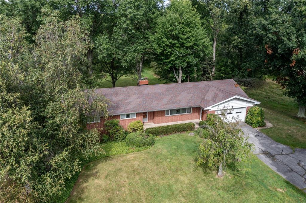 519 North Hermitage Road Hermitage, PA 16148 - Photo 36 of 38 an aerial view of a house with yard and large trees