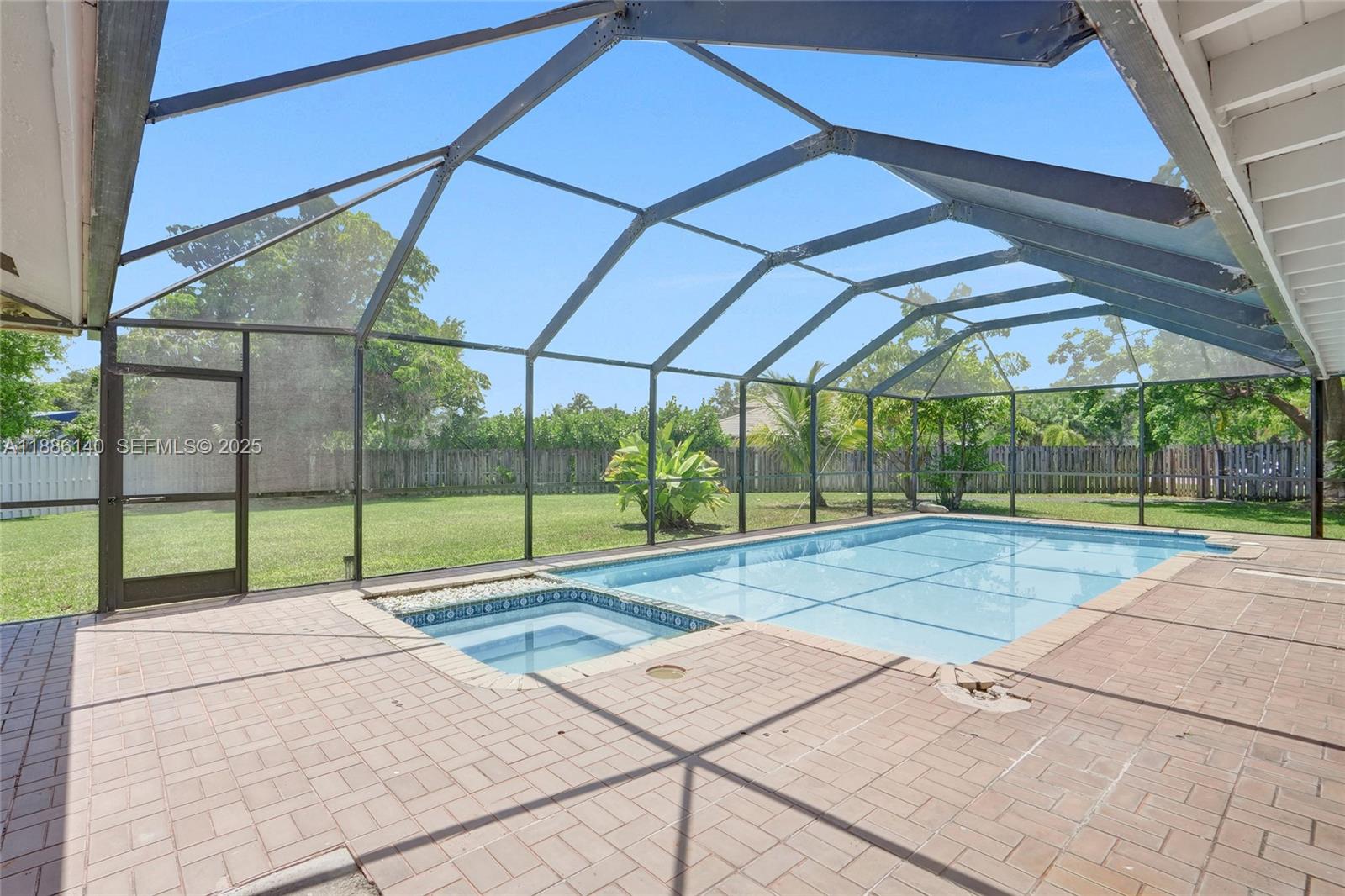 14940 Southwest 164th Terrace Miami, FL 33187 - Photo 68 of 73 a view of a backyard