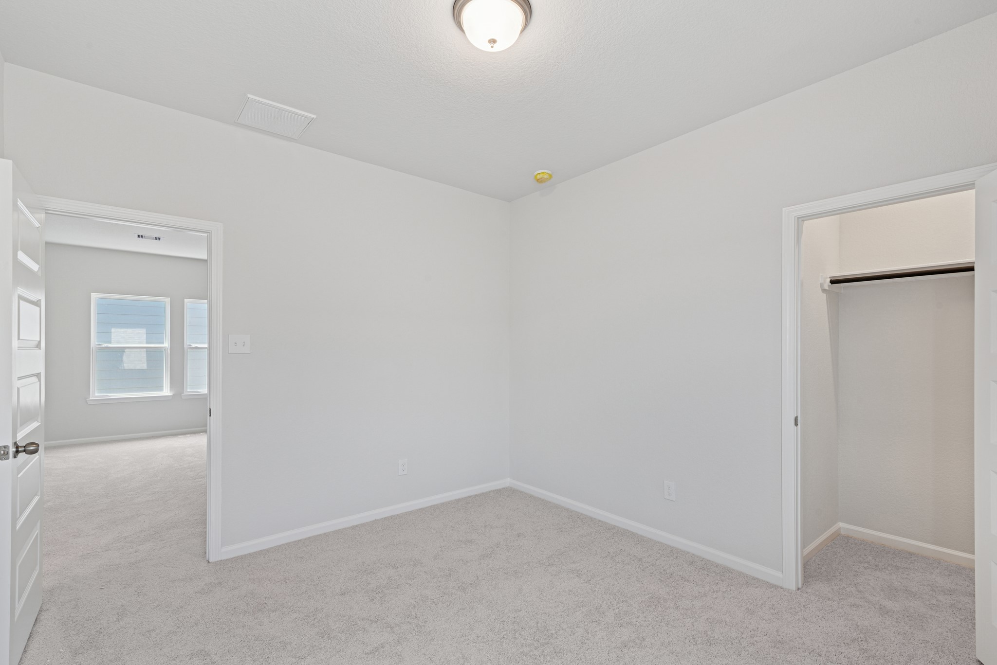 19130 Malatya Court Montgomery, TX 77316 - Photo 17 of 27 The Oriole II- Bedroom 3. Sample image to be used for example only, colors, options and upgrades vary.