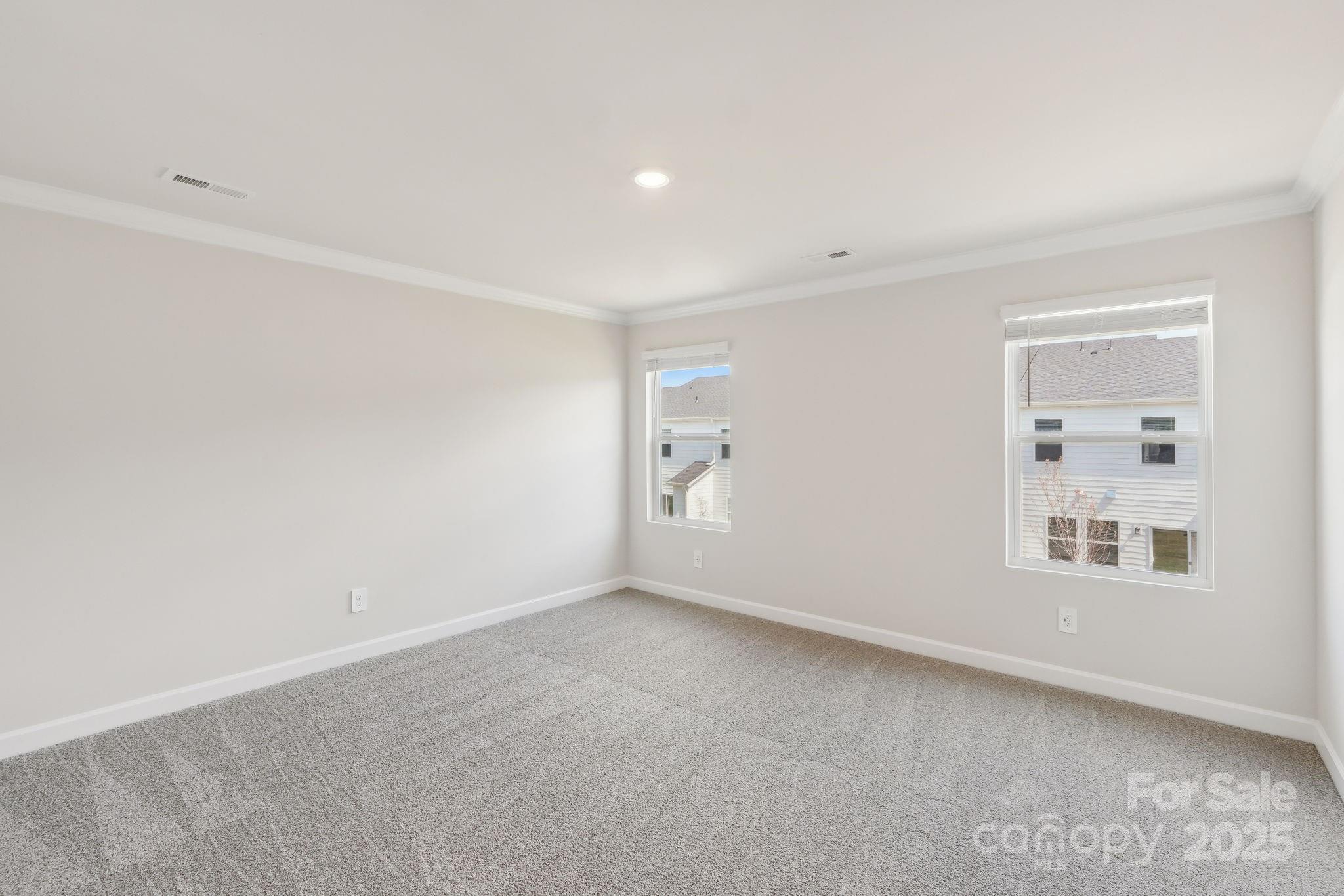 254 Tiger Lily Drive Fort Mill, SC 29708 - Photo 11 of 18 a view of empty room with windows