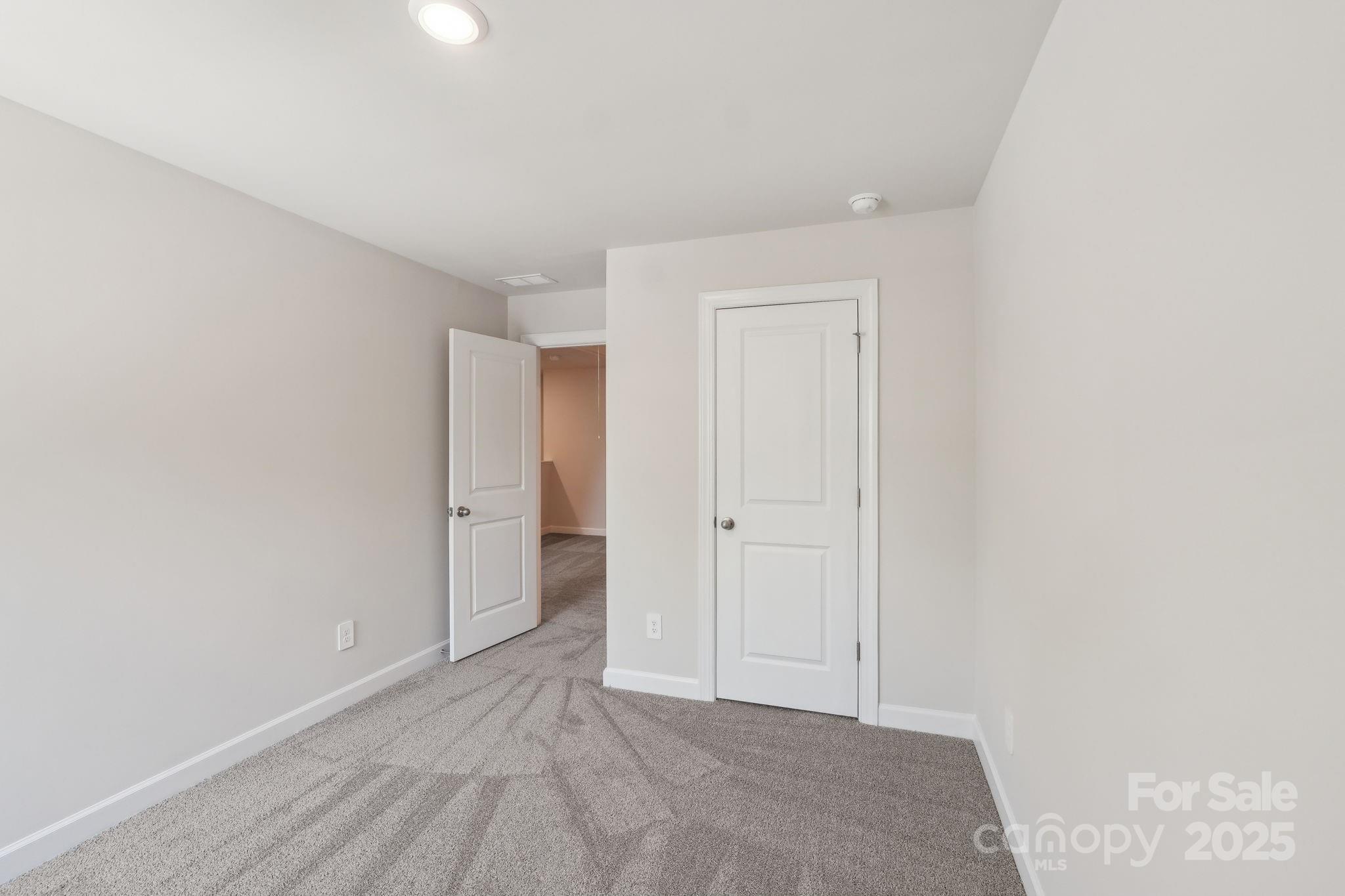 254 Tiger Lily Drive Fort Mill, SC 29708 - Photo 14 of 18 a view of an empty room