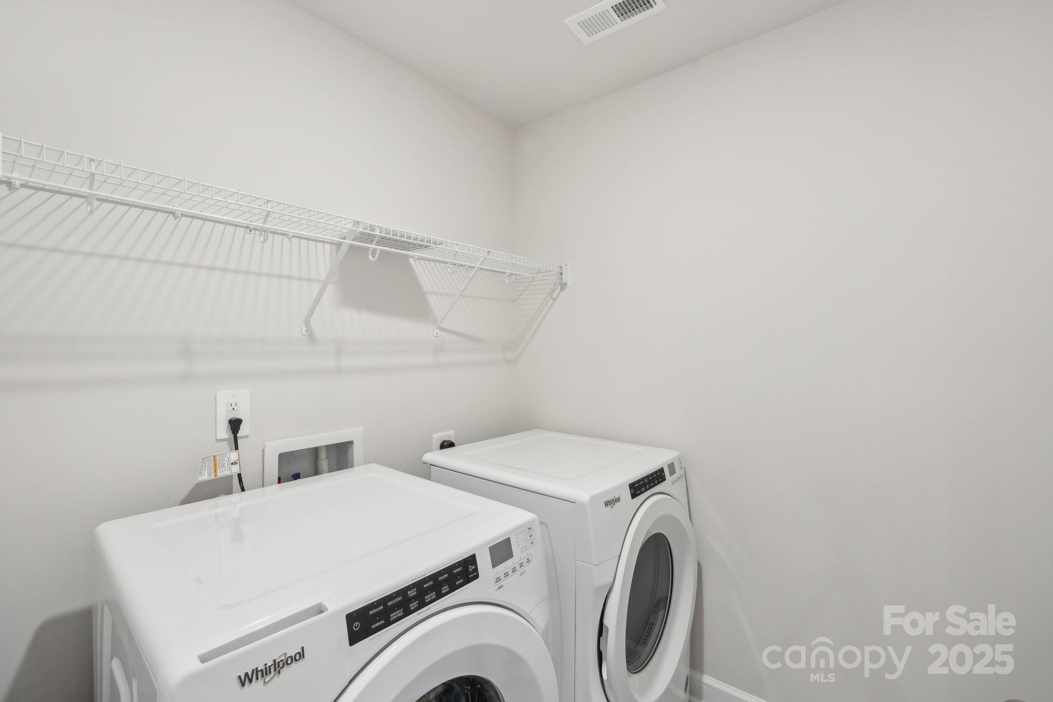 254 Tiger Lily Drive Fort Mill, SC 29708 - Photo 15 of 18 a utility room with dryer and washer