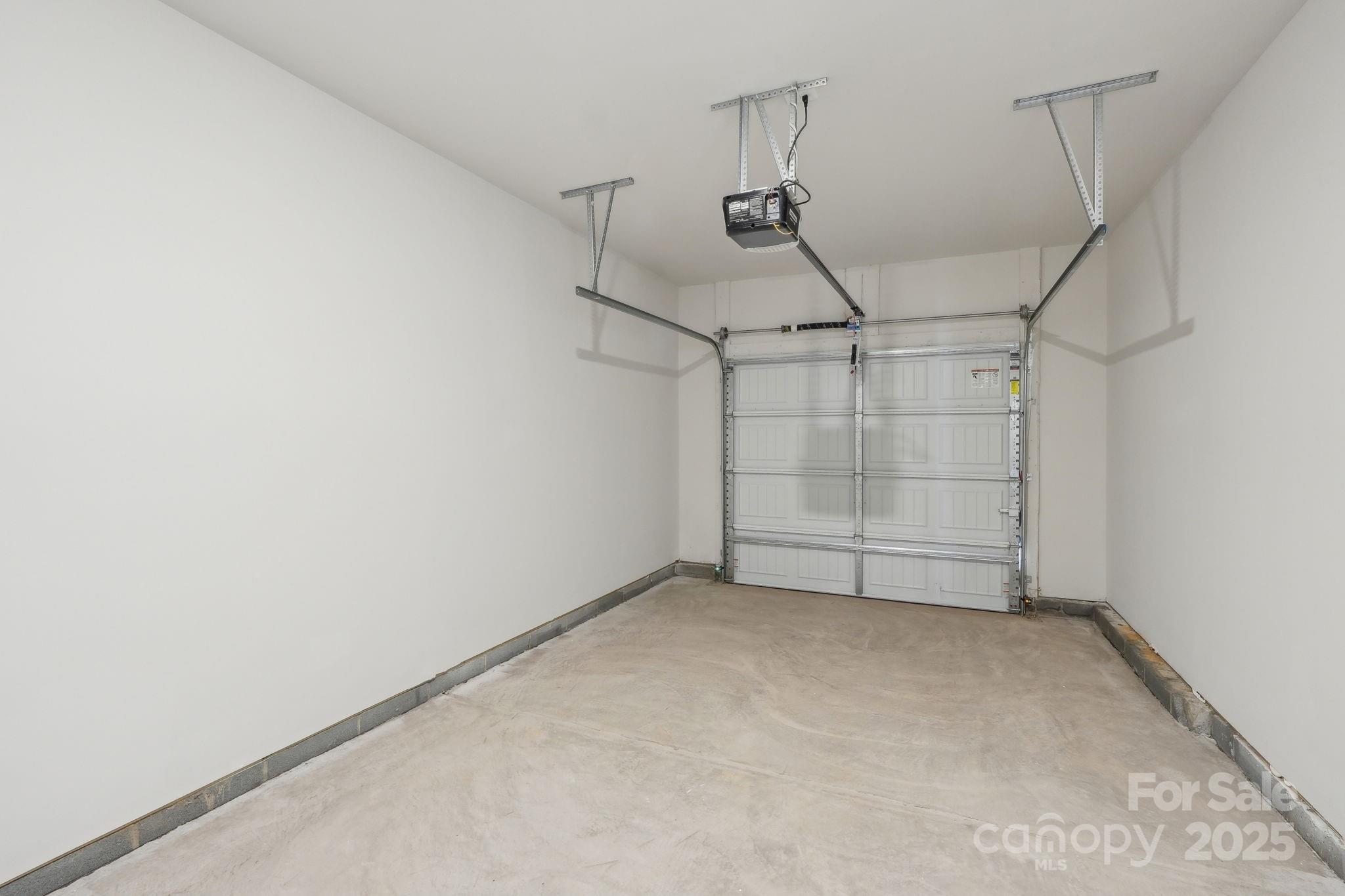 254 Tiger Lily Drive Fort Mill, SC 29708 - Photo 16 of 18 a view of a room with racks on the wall