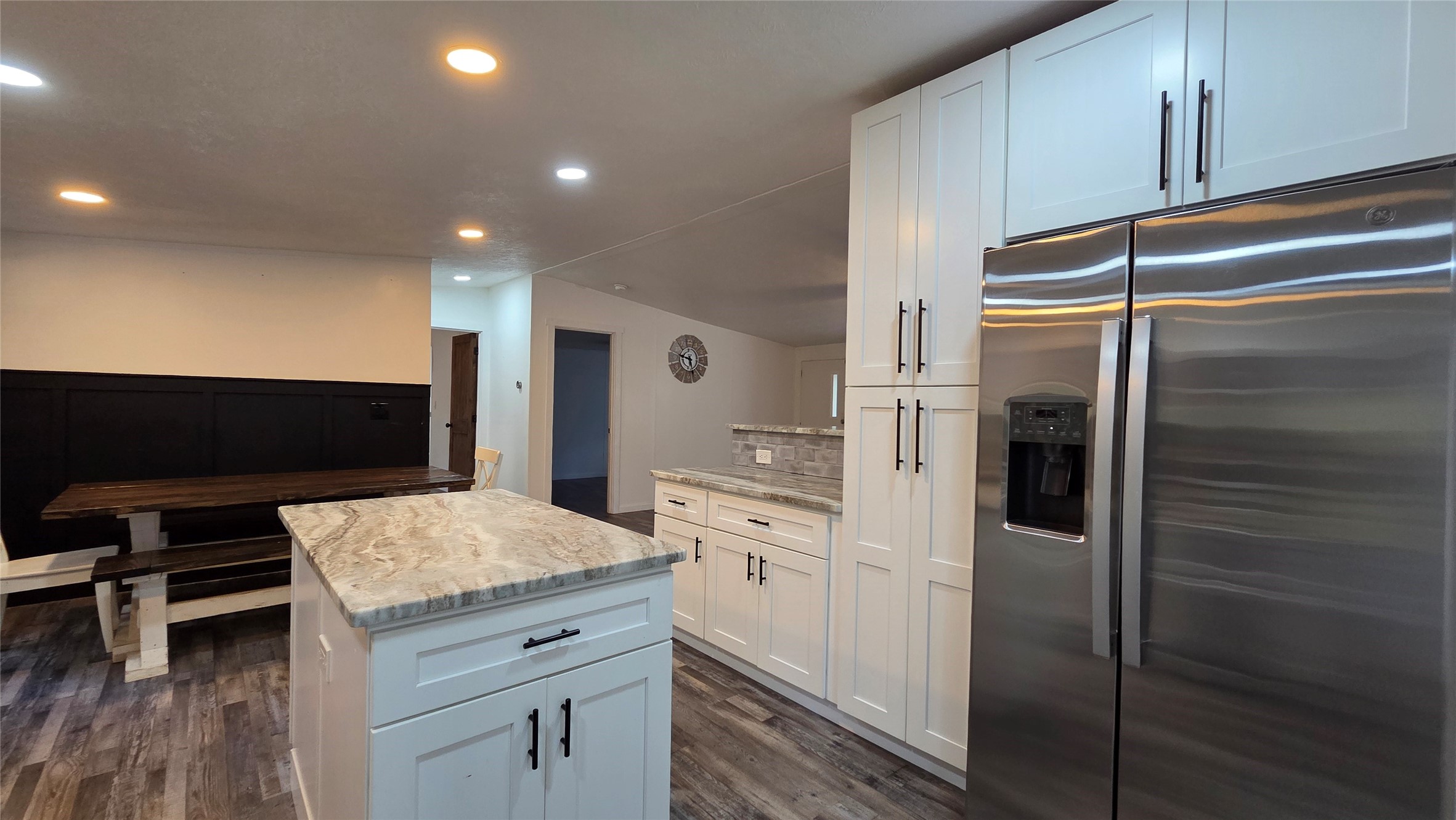21150 Arnsworth Road Montgomery, TX 77356 - Photo 11 of 16 a kitchen with a refrigerator and microwave