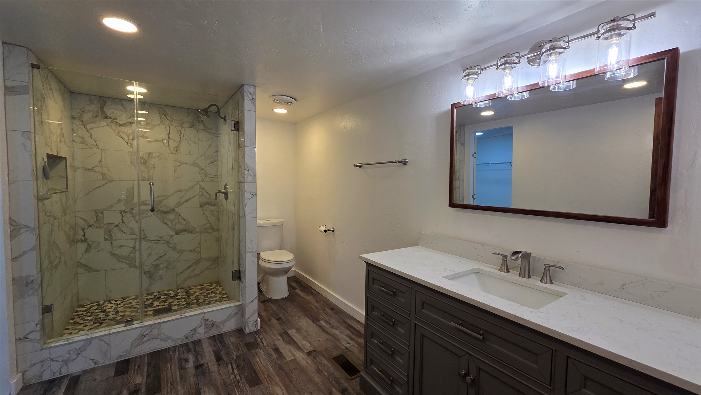 21150 Arnsworth Road Montgomery, TX 77356 - Photo 13 of 16 a bathroom with a double vanity sink mirror and shower