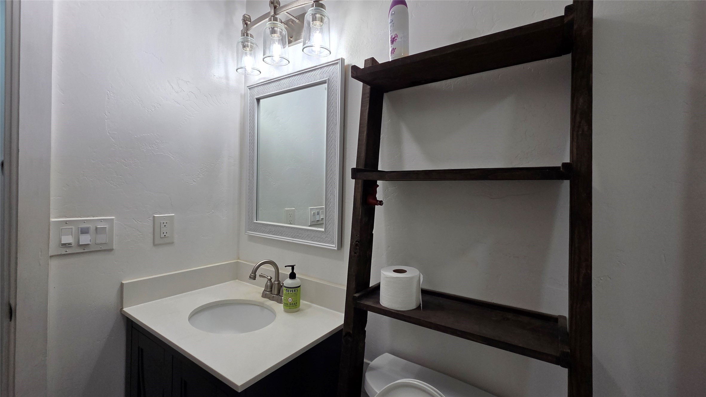 21150 Arnsworth Road Montgomery, TX 77356 - Photo 16 of 16 a bathroom with a sink and mirror