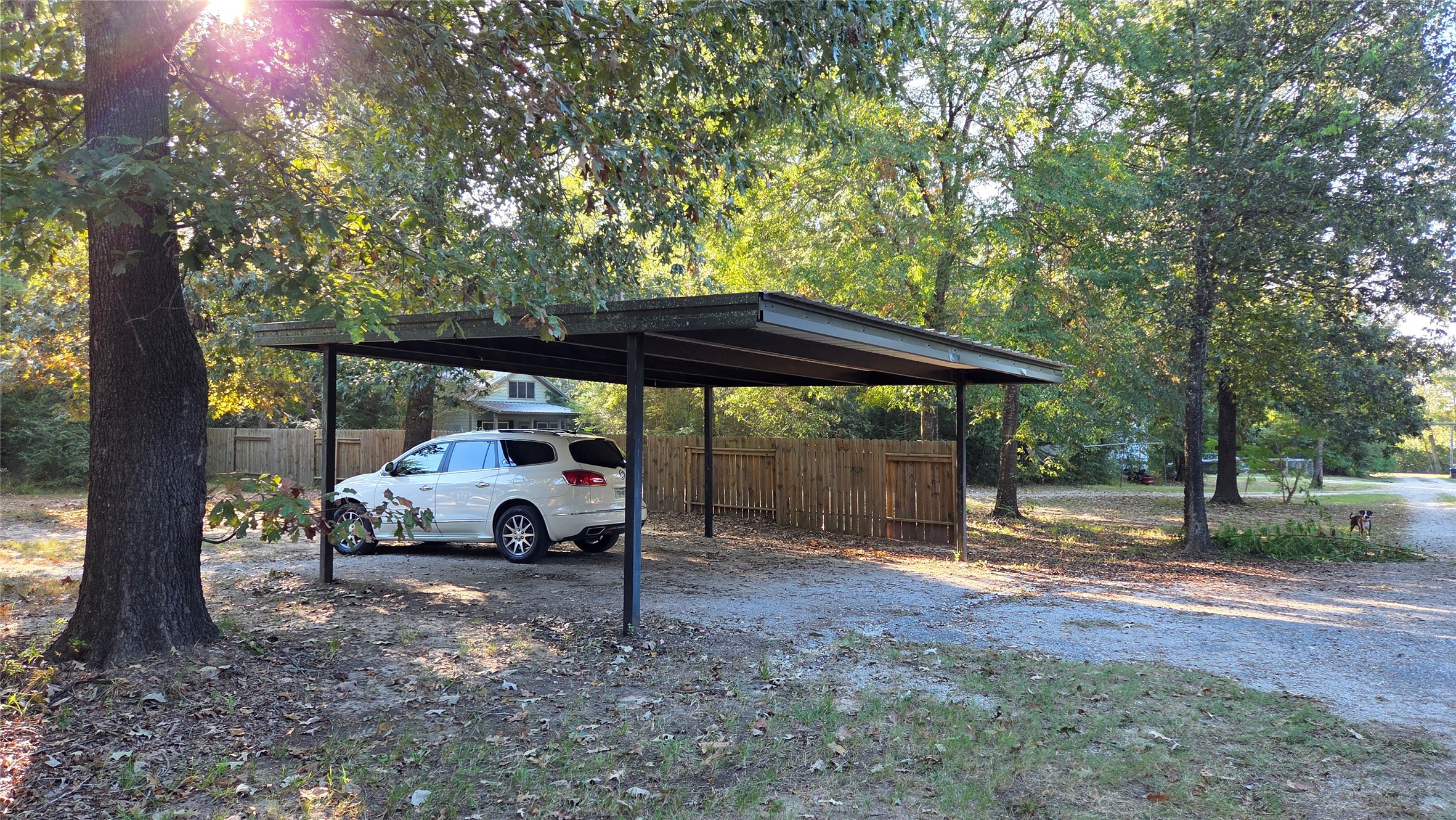 21150 Arnsworth Road Montgomery, TX 77356 - Photo 3 of 16 a car parked in front of a white house