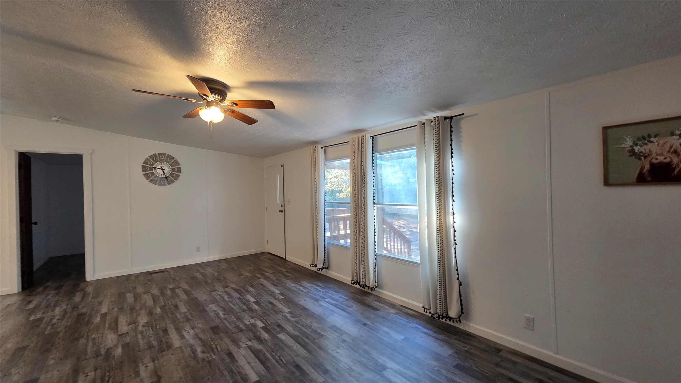21150 Arnsworth Road Montgomery, TX 77356 - Photo 6 of 16 wooden floor in an empty room with a window