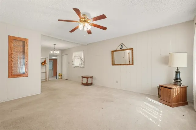 a view of a livingroom with a workspace