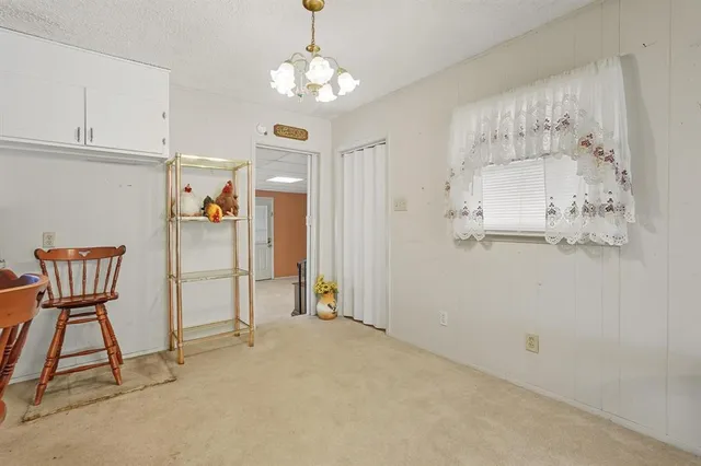 a view of a livingroom with a chandelier