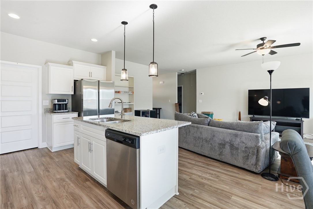 141 Haydon Court Rincon, GA 31326 - Photo 26 of 43 Kitchen and Fmily Room View
