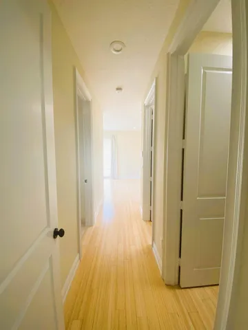 a view of a bathroom with a glass door